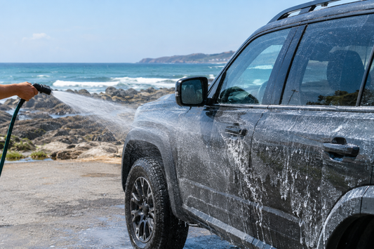Car near the beach being rinsed to remove salt residue